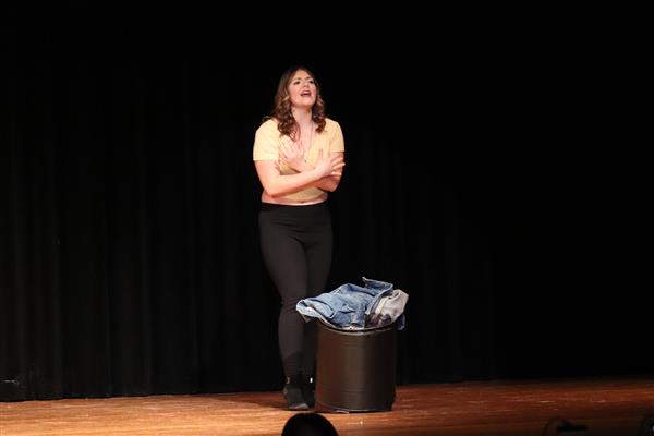 Samantha as Amy burning the boyfriend jacket