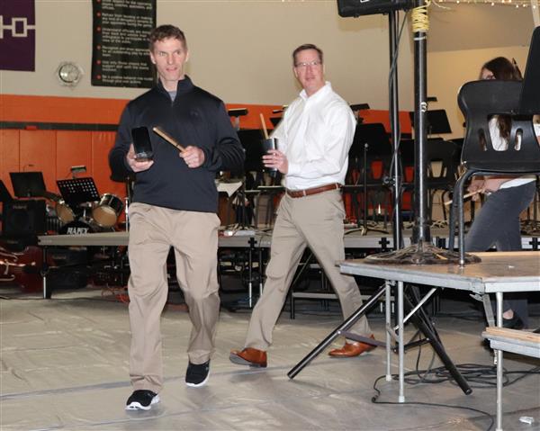 Mr. Caprio & Mr. McCabe accompany the band with cowbells