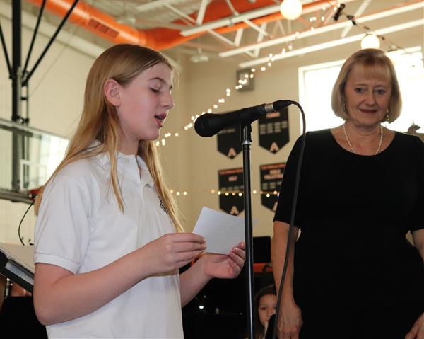 Student introducing next piece