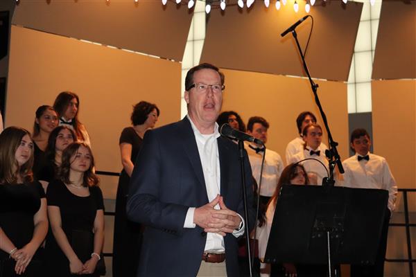 Mr. McCabe welcomes guests