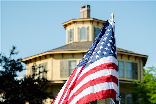 US Flag with Octagon House in background