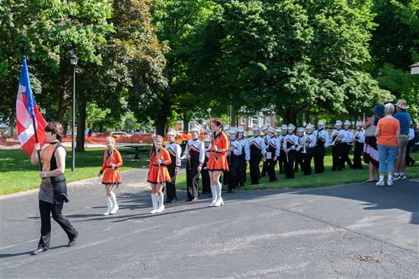 Marching Band maneuvering to Main Street