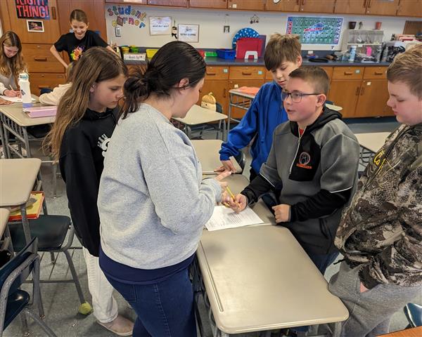 Mrs. Hooper with students