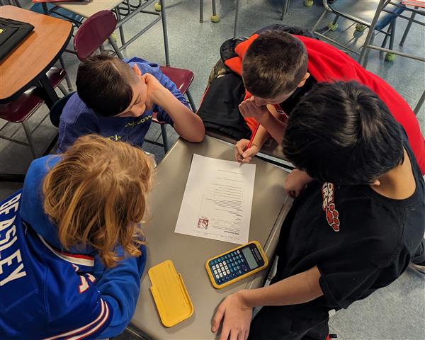 Students working through challenge