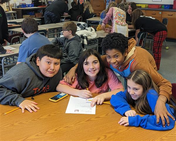 Students working through challenge
