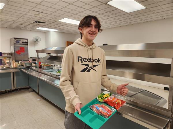 Gus gives a thumbs up for the salad