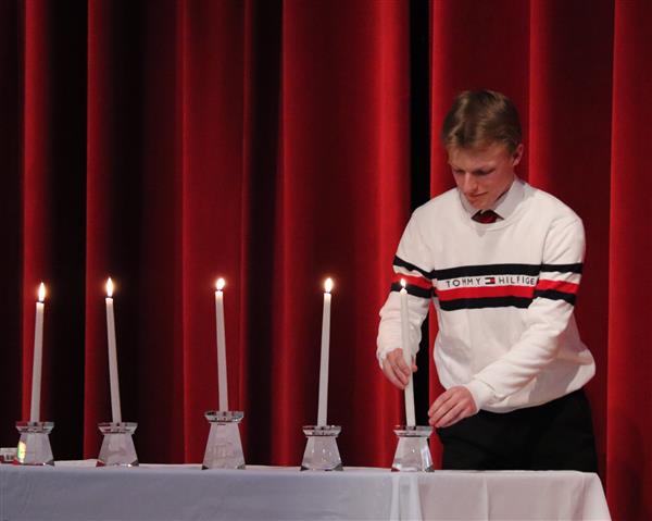 Steven lighting candle