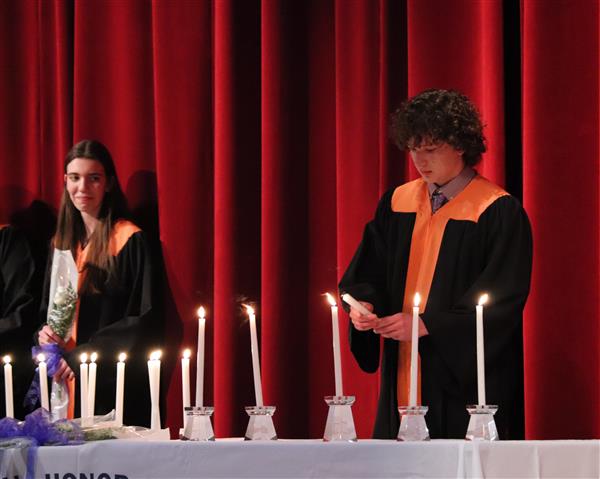Evan Liss lighting candle