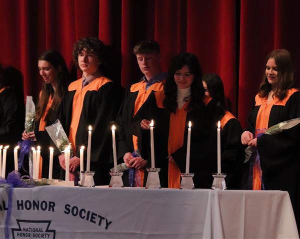 Juliana Rodriguez lighting candle