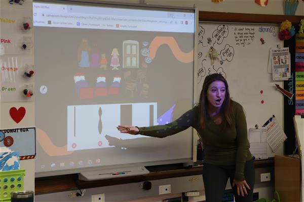 Mrs. O'Malley at the Smartboard