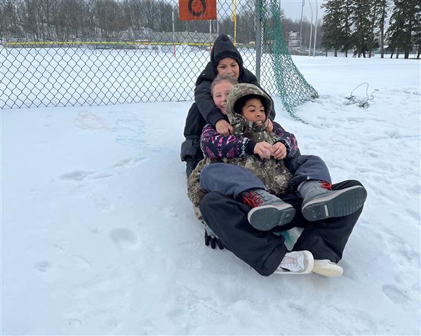 Three on a sled