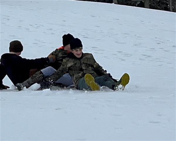 Sledding on plastic