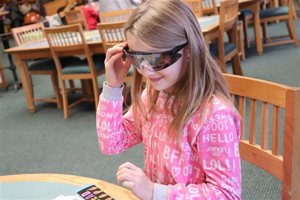 Trying vision simulating glasses
