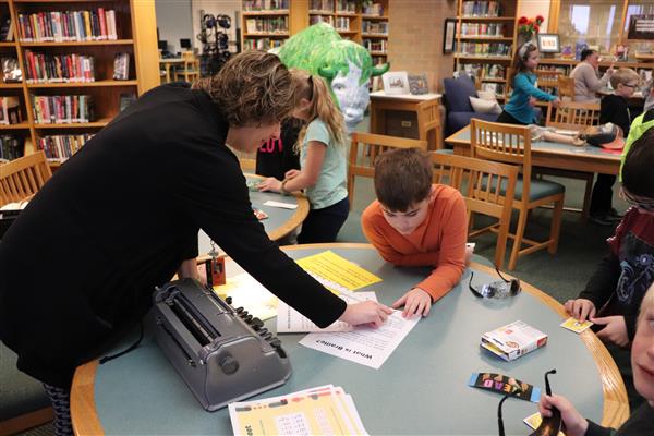 Mrs. Martin explaining braille