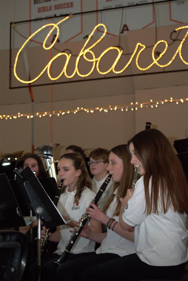 7th & 8th Grade Band with Cabaret sign