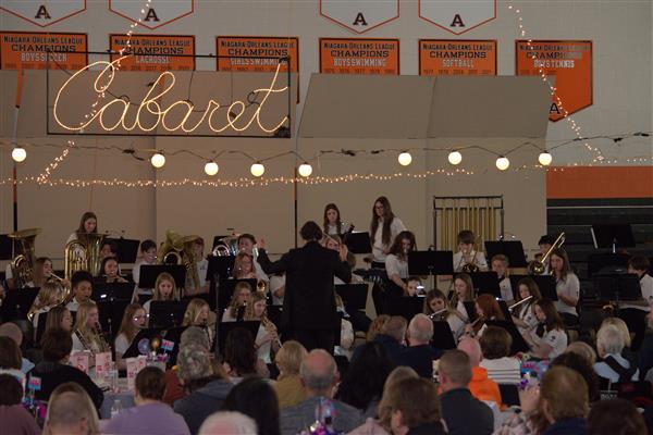 7th & 8th Grade Band with Mr. Bardo and Cabaret sign