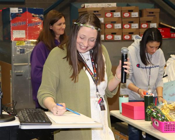 Mrs. Cochrane making calculations