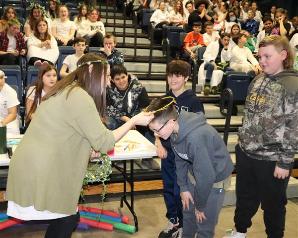 Winners crowned with head wreaths