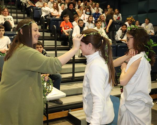 Winners crowned with head wreaths