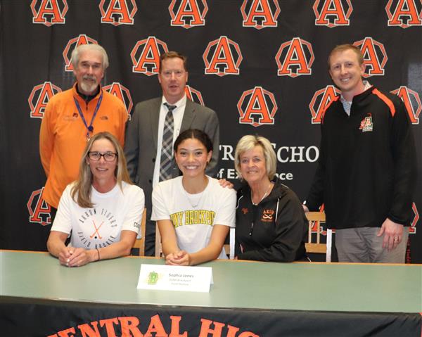 Sophia Jones with coaches and administration
