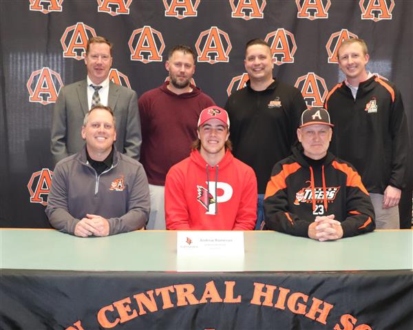 Andrew Romesser with coaches and admininstration