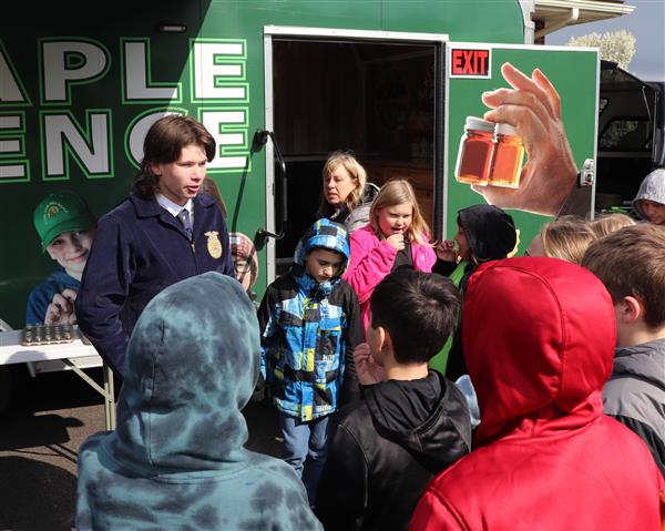 FFA member speaking to students