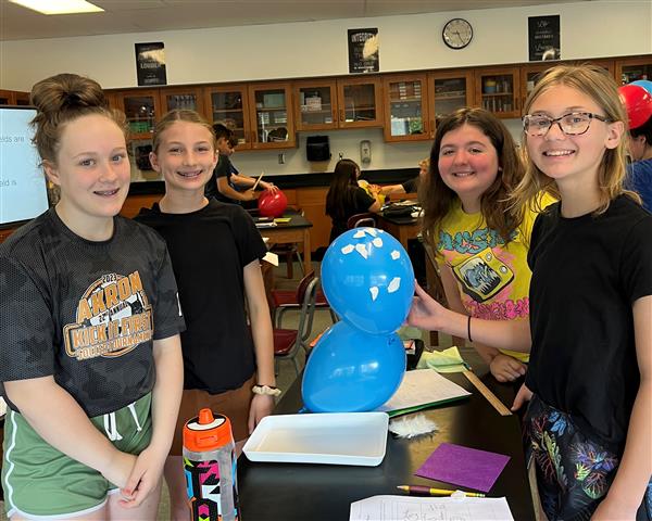 Students experimenting with static electricity