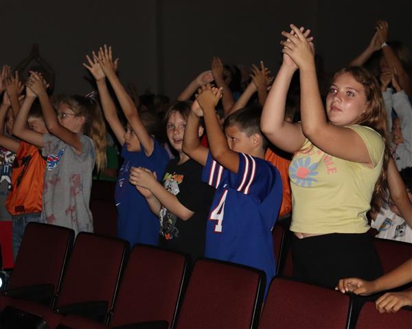 Students clapping
