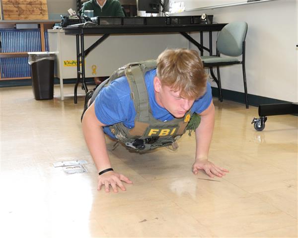 Logan completing push up challenge