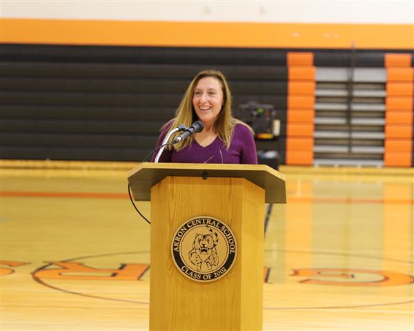 Nancy Bennett presenting Casey Neill O'Merritt