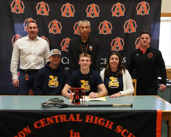 Nick with parents, coach, Mr. Morello, and Mr. Dimitroff