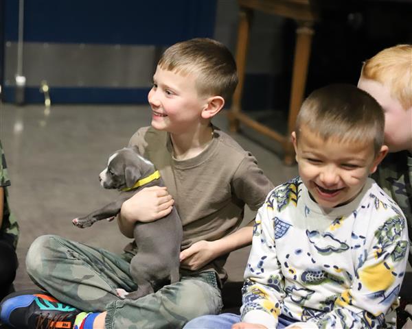 Students with puppies