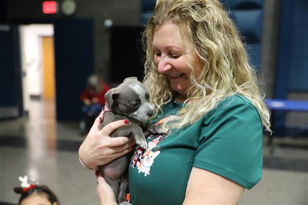 Mrs. Samolis with puppy