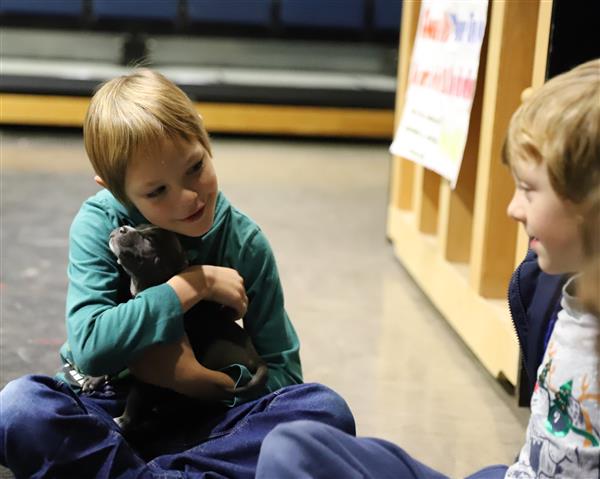 Students with puppies