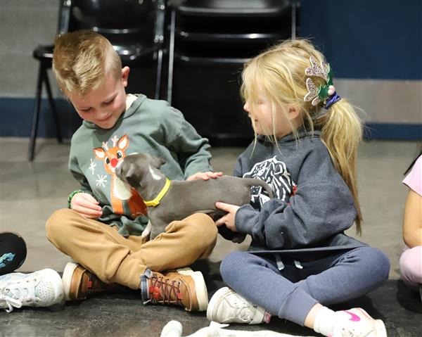 Students with puppies
