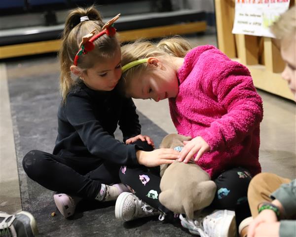 Students with puppies