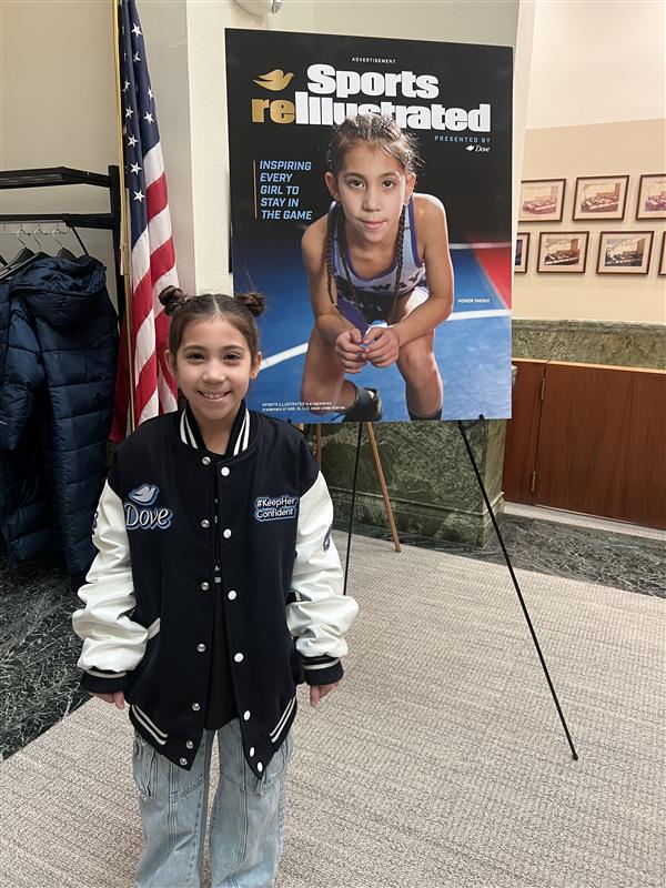 Honor next to Poster