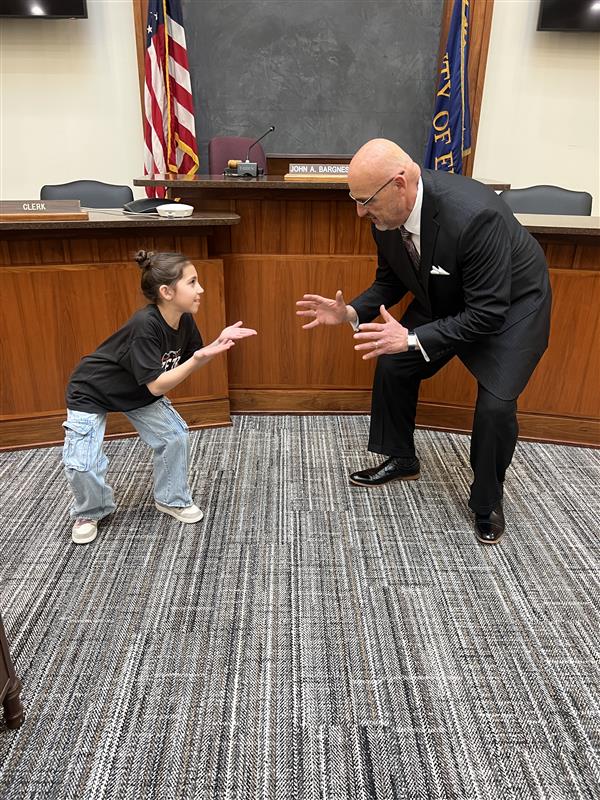 Honor showing wrestling moves with Legislator Bargnesi