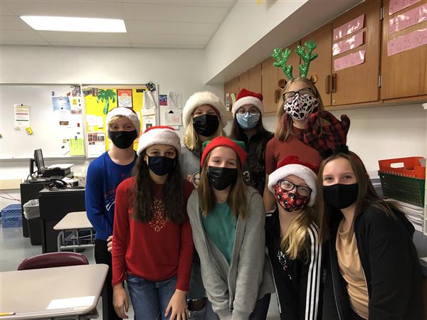 Group of students with holiday hats