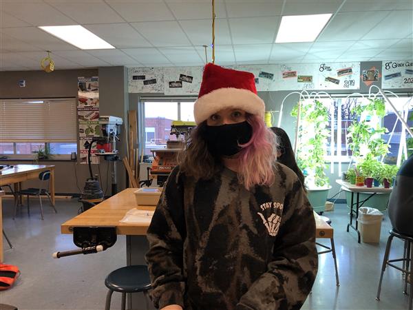 Student wearing santa hat