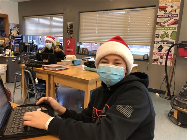 Student wearing santa hat