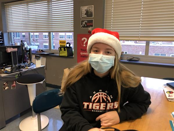 Student wearing santa hat